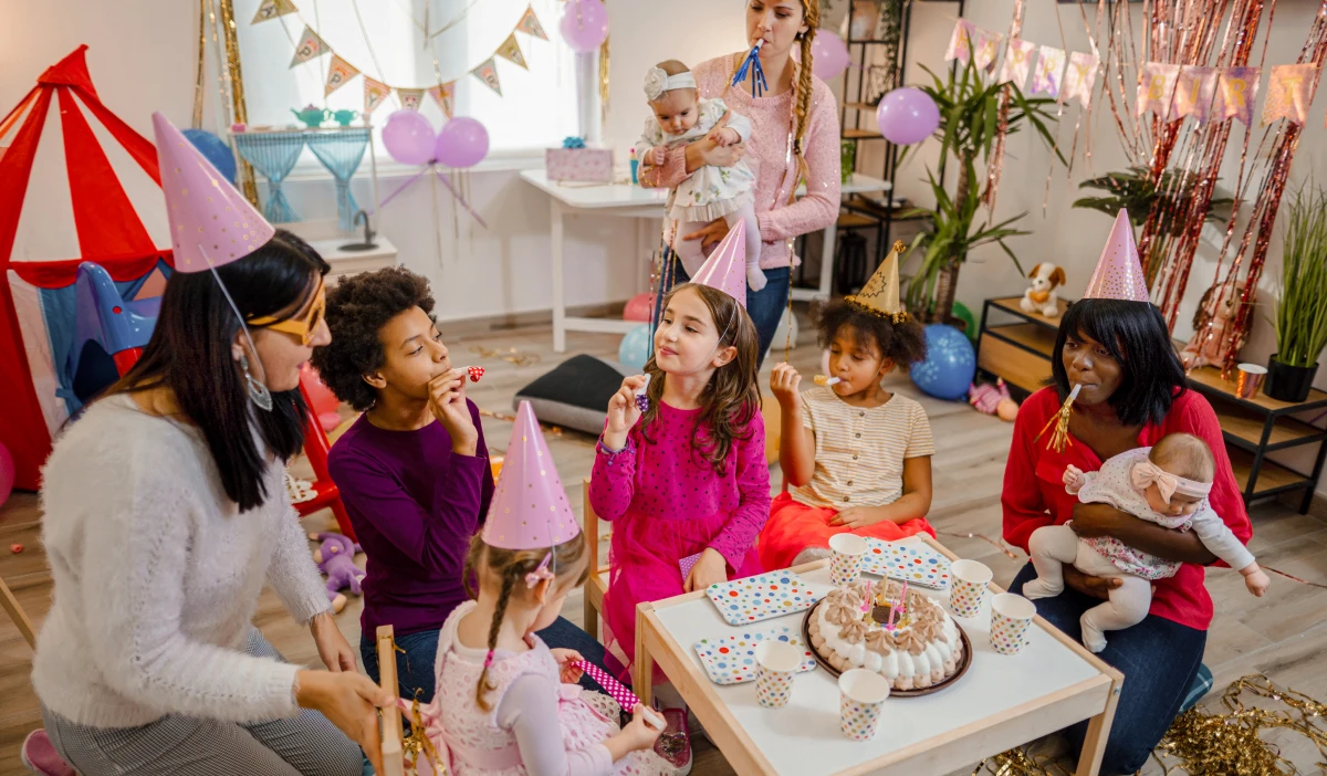 Kids wearing party hats at celebration